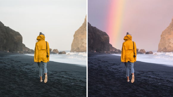 girl on beach watching rainbow
