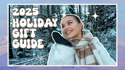 Woman in winter outfit with text reading 2025 holiday gift guide on snowy forest background