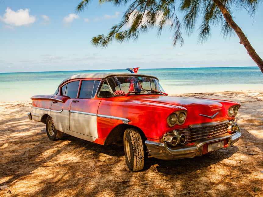A classic car on the beach