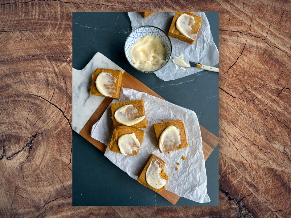 Pumpkin spice blondies on cutting board and slab