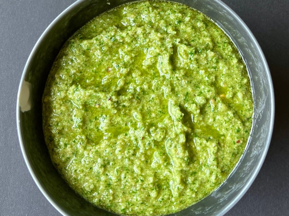 Close up of pesto bowl with small chip on left side