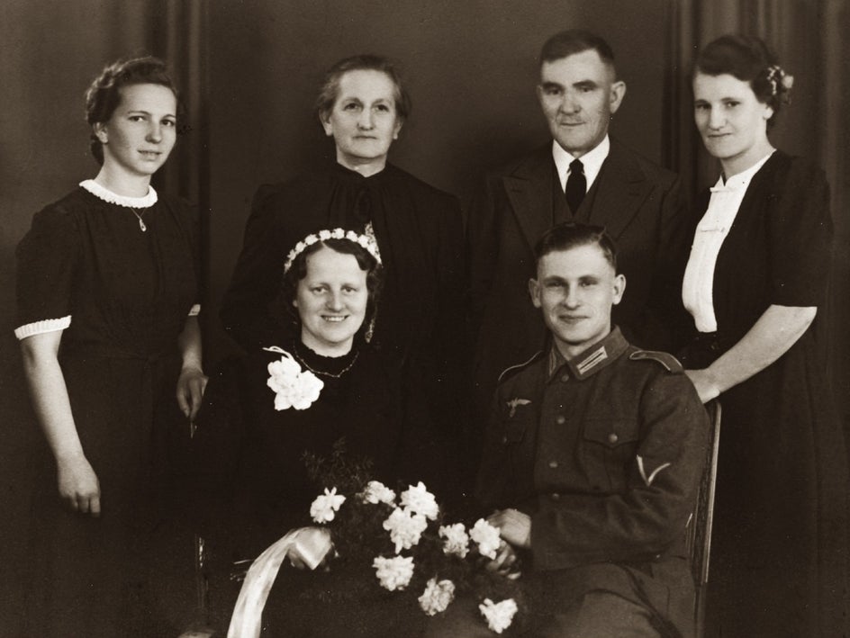 Old family portrait faded and worn